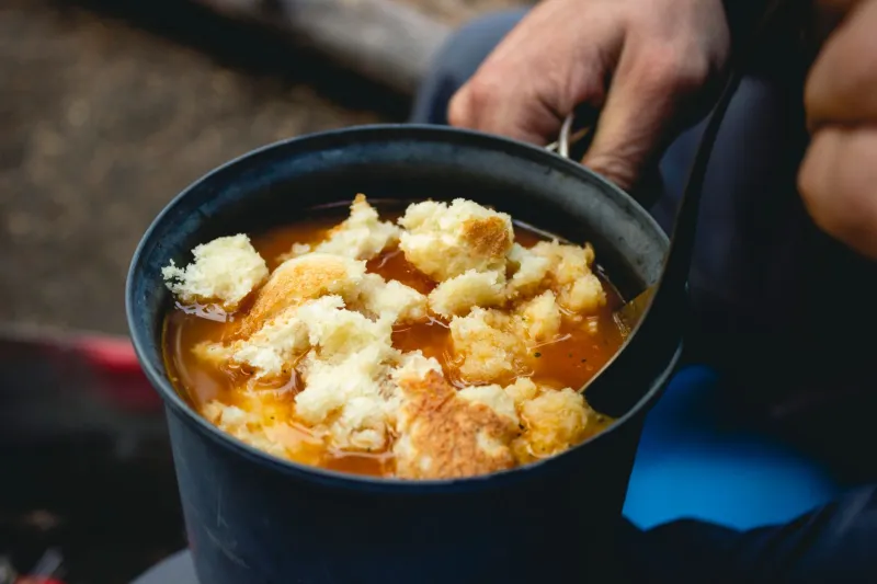 Hot Soup at Minus Forty: The Checkpoint Cooks Who Keep the Quest Alive